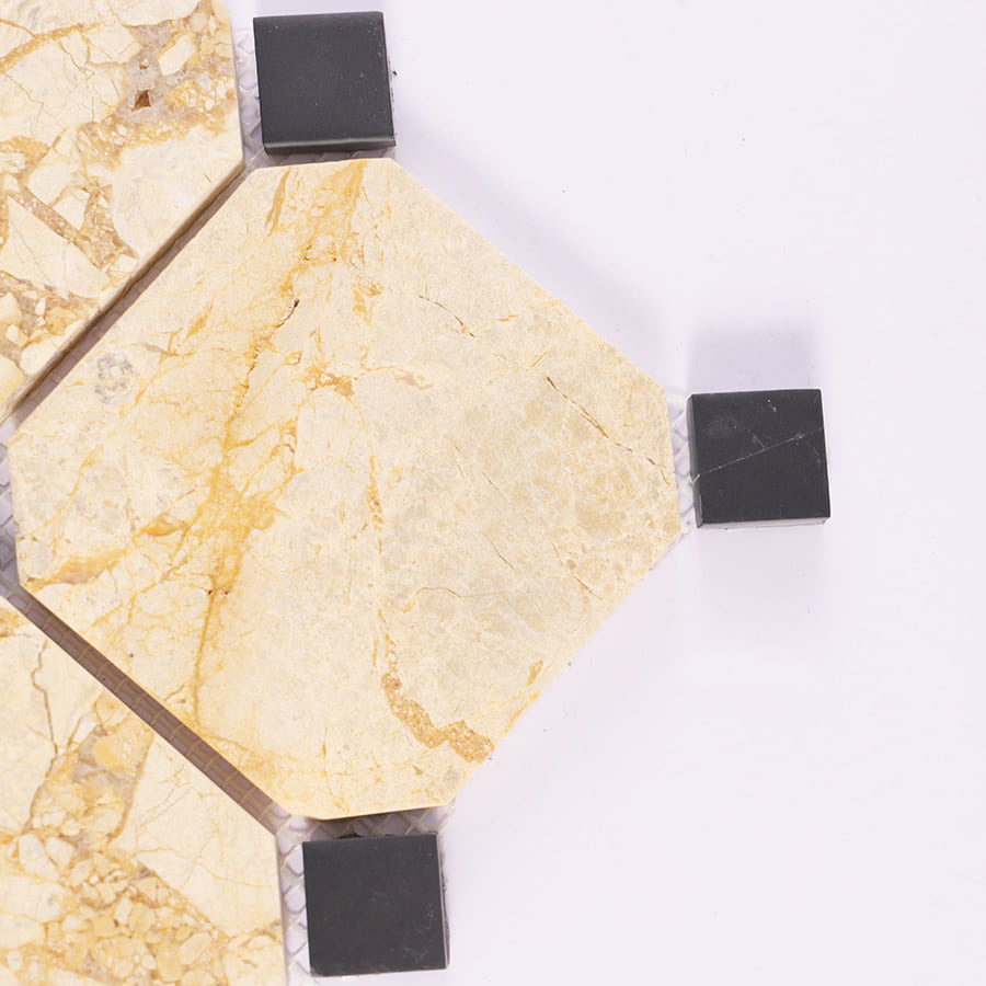 Close-up of beige octagon marble mosaic with black square accents