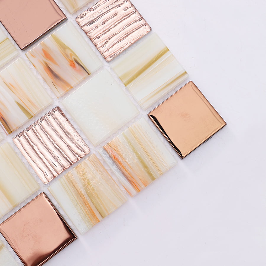 Close up of corner showing rose gold and beige textured tiles