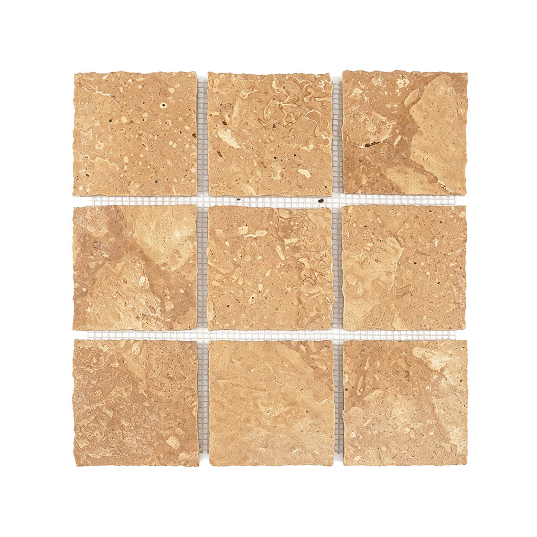 Beige square marble mosaic tile with natural variations and rustic edges