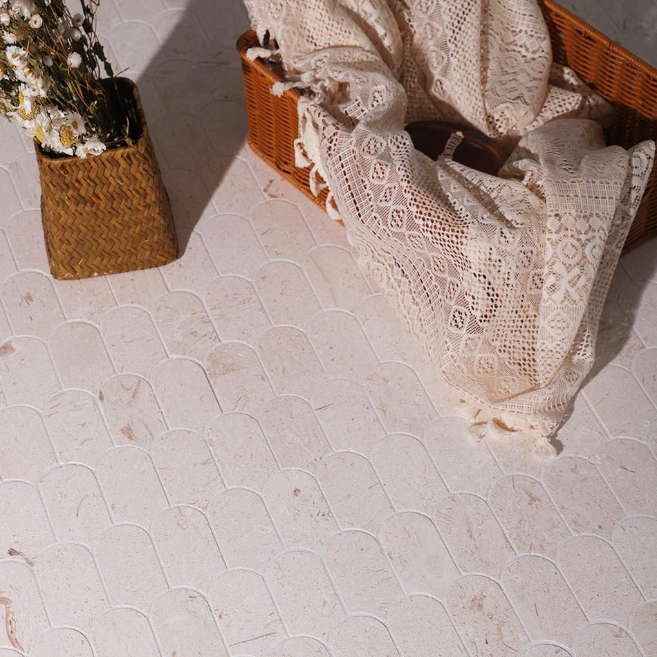 Beige stone mosaic floor fish scale pattern