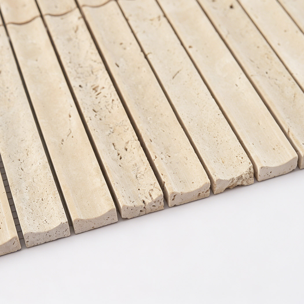 Edge detail of beige travertine rectangular strip mosaic tile with porous texture