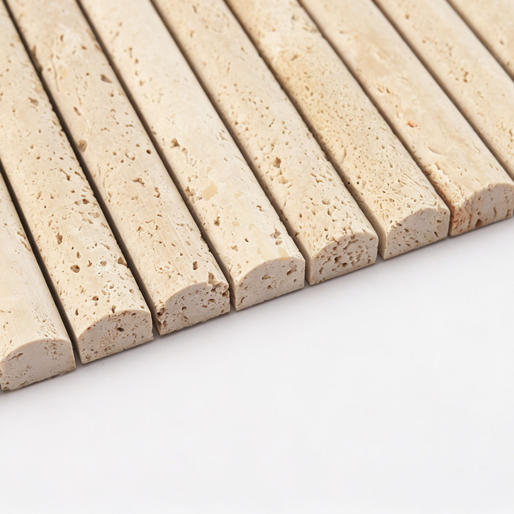 Side view of beige travertine rounded edge mosaic tile showing raised curved profile