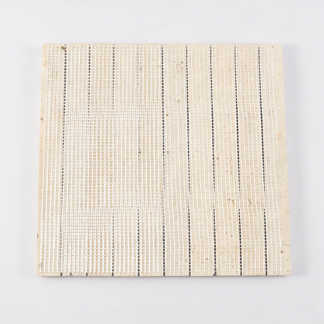 Back view of beige travertine wide vertical tile sheet with mesh backing