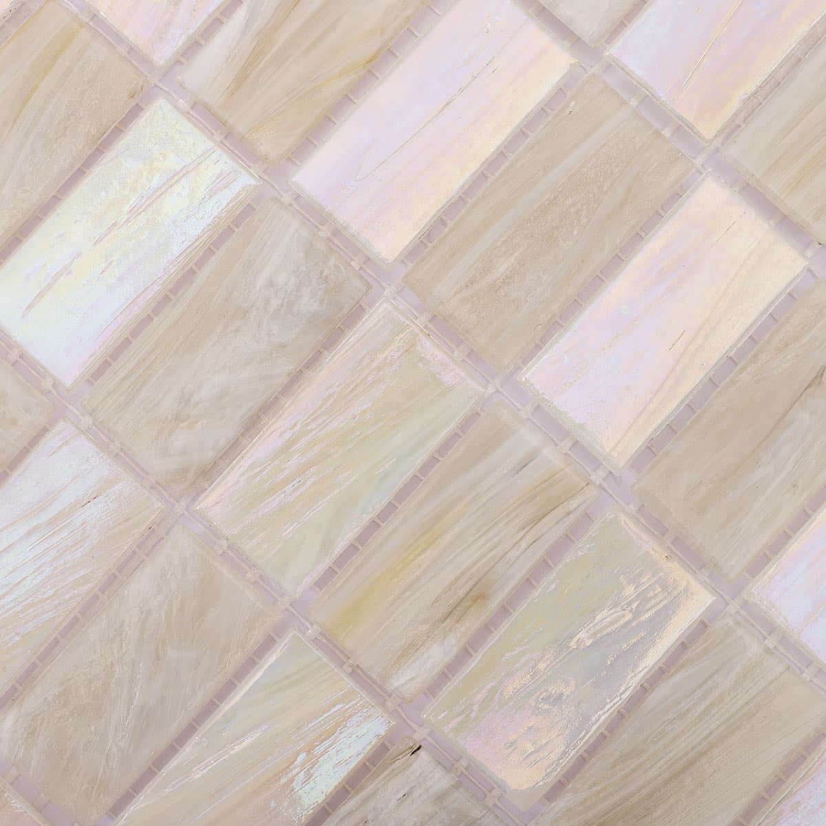 Surface detail of checkered beige and white iridescent rectangular mosaic tile