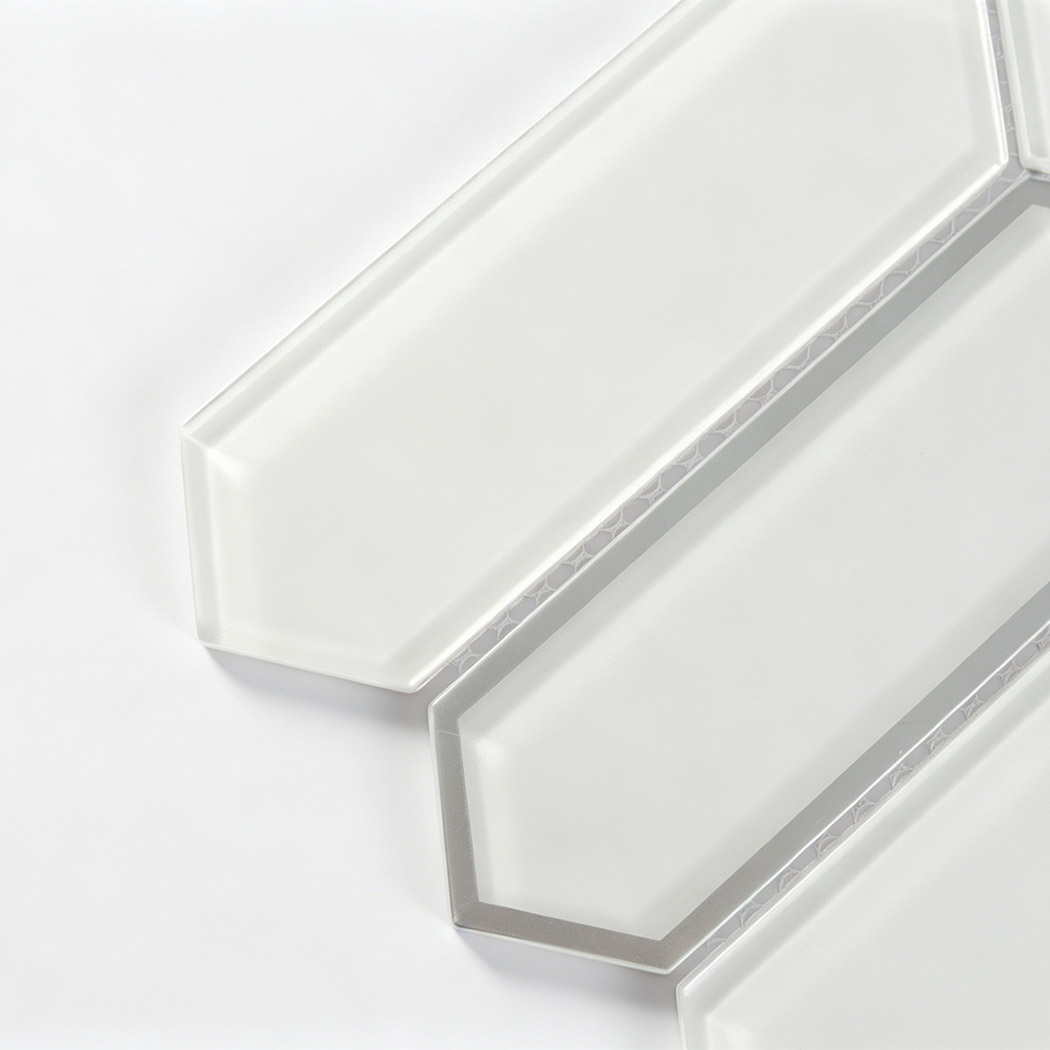 Close up of beveled white glass elongated hexagon mosaic tiles