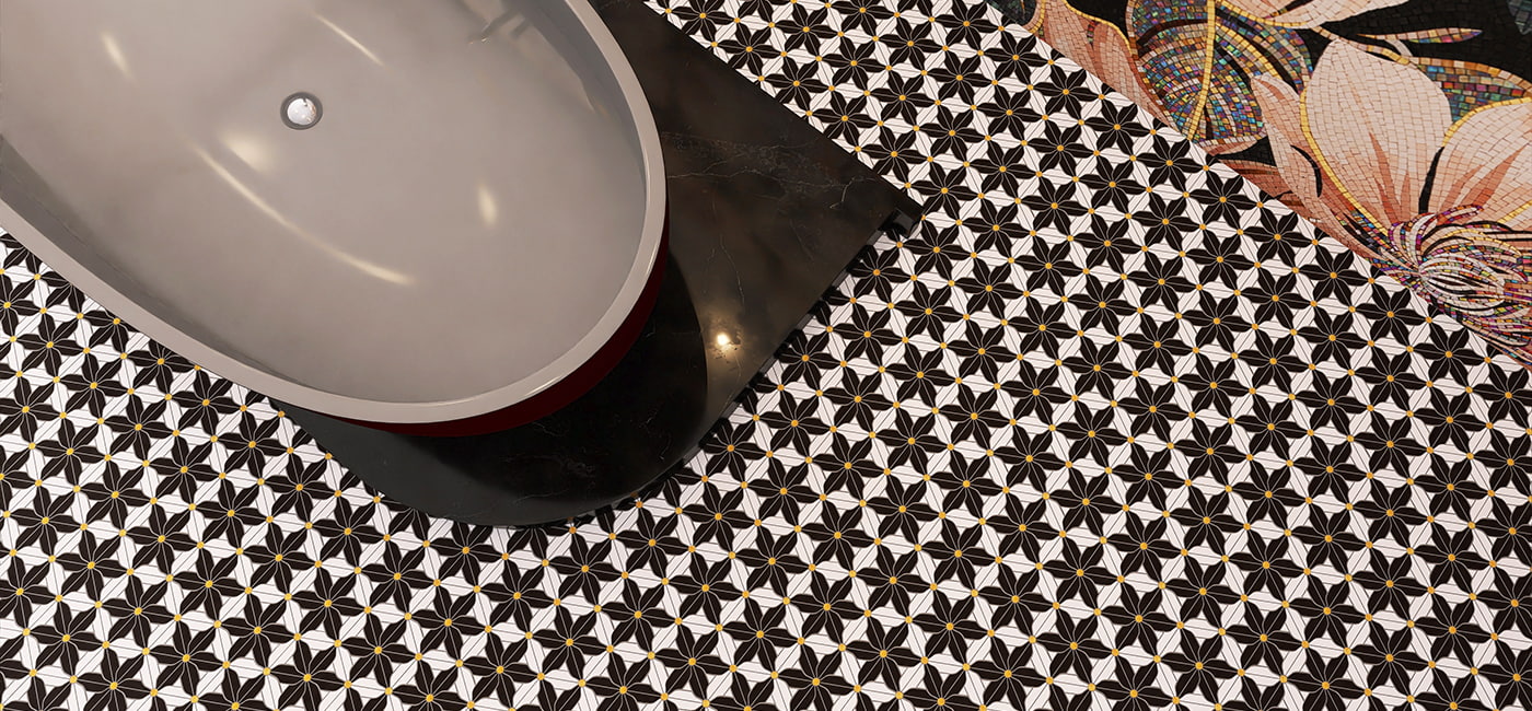 Artistic black and white floral marble tile in a bathroom floor setting