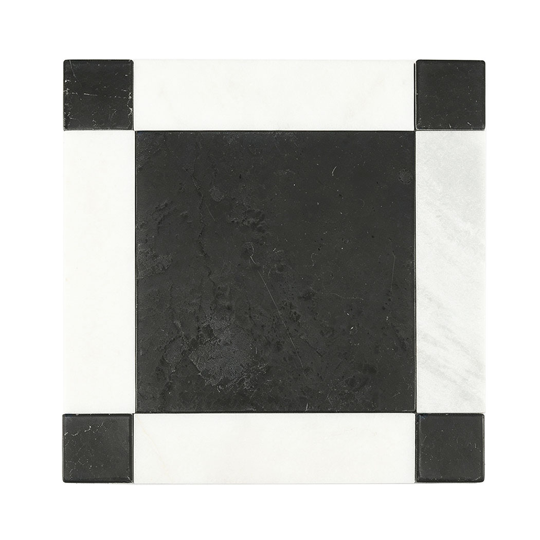 Black and white square marble mosaic tile with a geometric border design