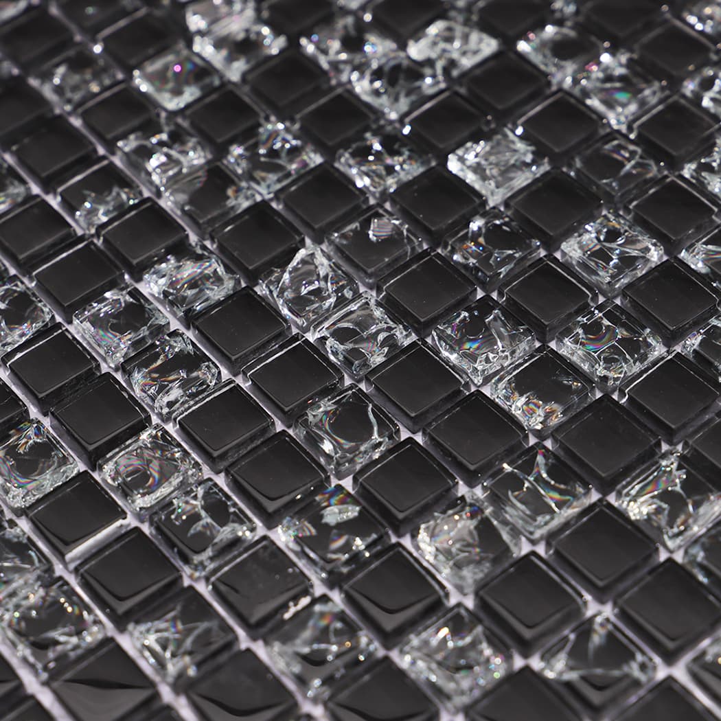 Close-up of black and clear mixed glass mosaic tile pattern