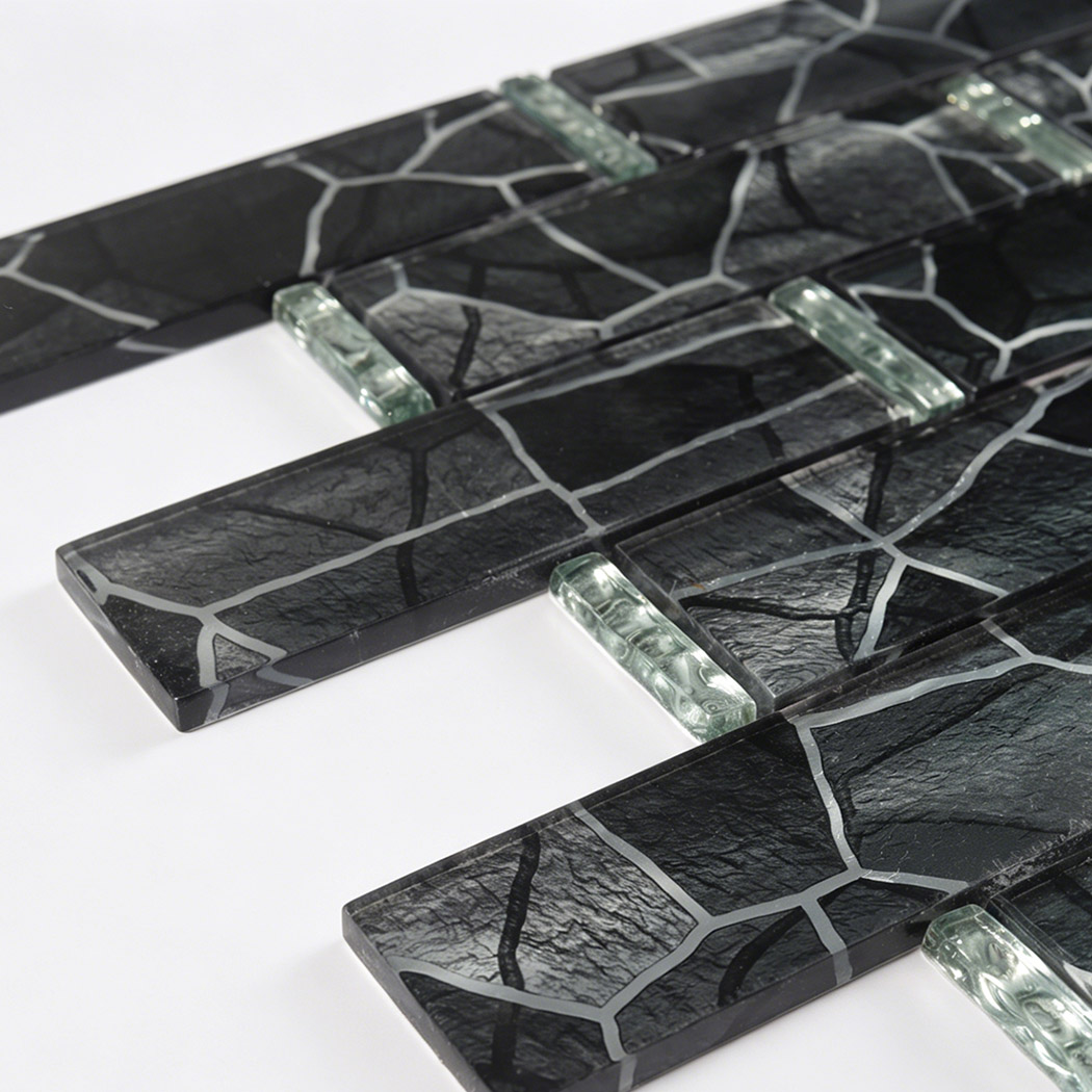 Close up of black crackle long glass mosaic tile with clear glass accents