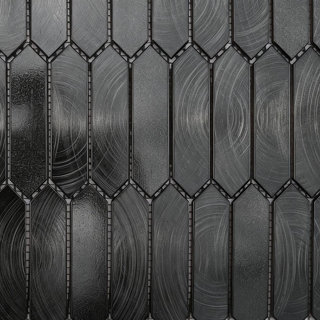 Macro texture showing circular brushed grain on black metal tile