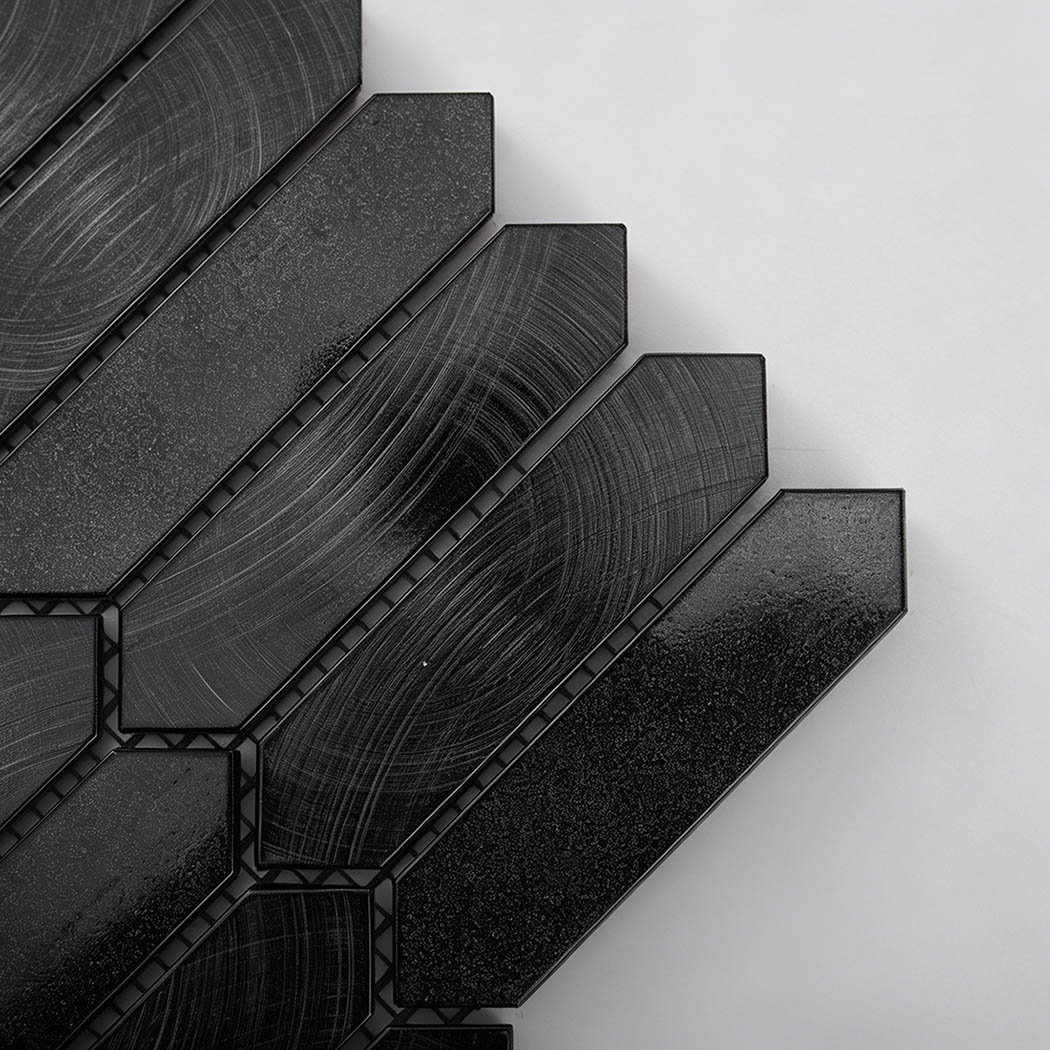 Close up of corner layout on black elongated picket mosaic tile
