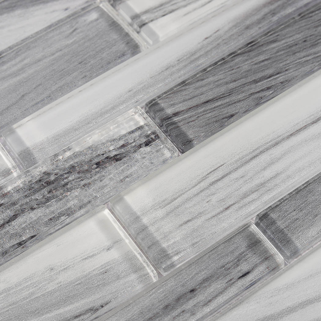 Macro texture of black gray veined linear glass strips with glossy raised surface