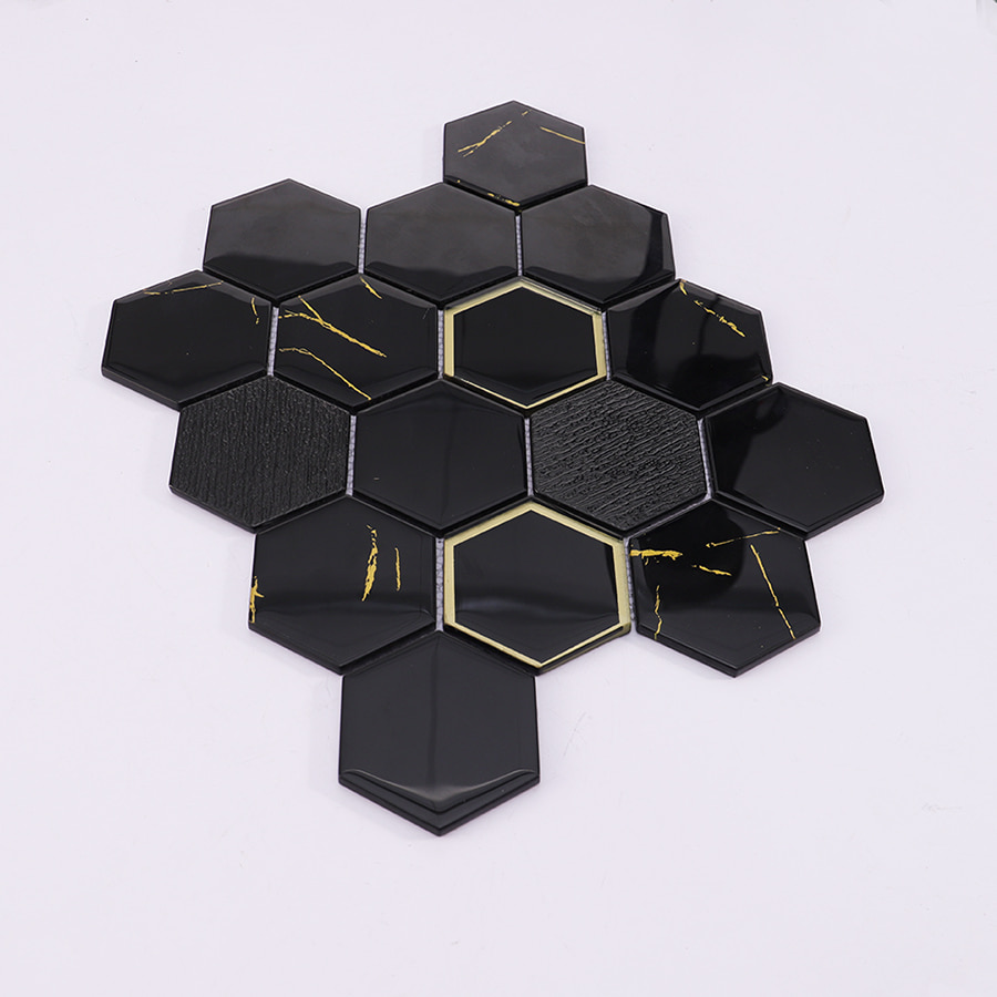 Side angle view of black hexagon gold vein mosaic tile sheet.