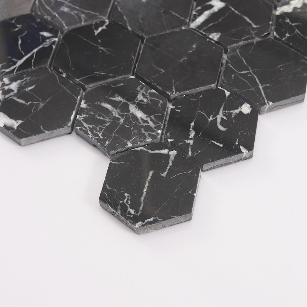 Side angle view of black hexagon marble mosaic tile showing thickness