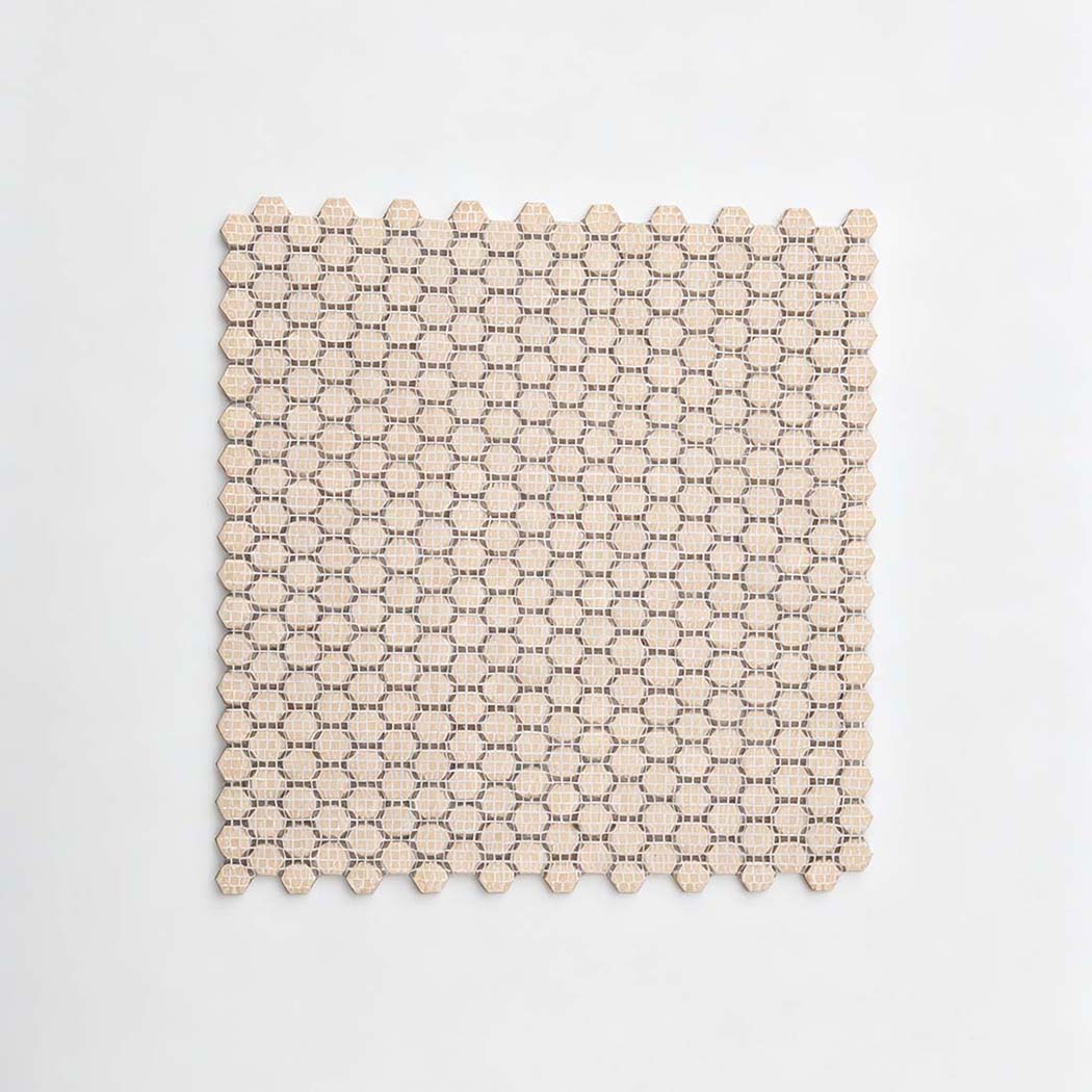 Back view showing fiberglass mesh on black hexagon tile sheet