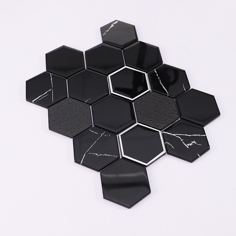 Side view showing the thickness and texture of black hexagon silver vein glass mosaic tile.