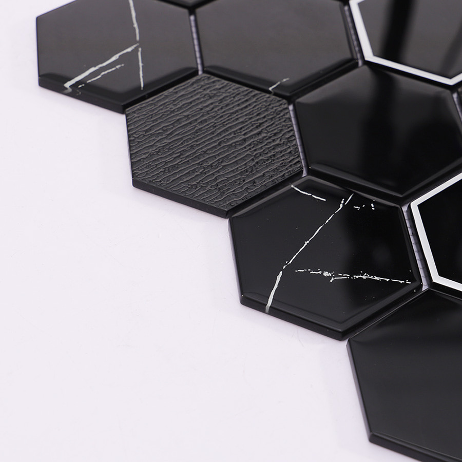 Side view showing the thickness and texture of black hexagon silver vein glass mosaic tile.