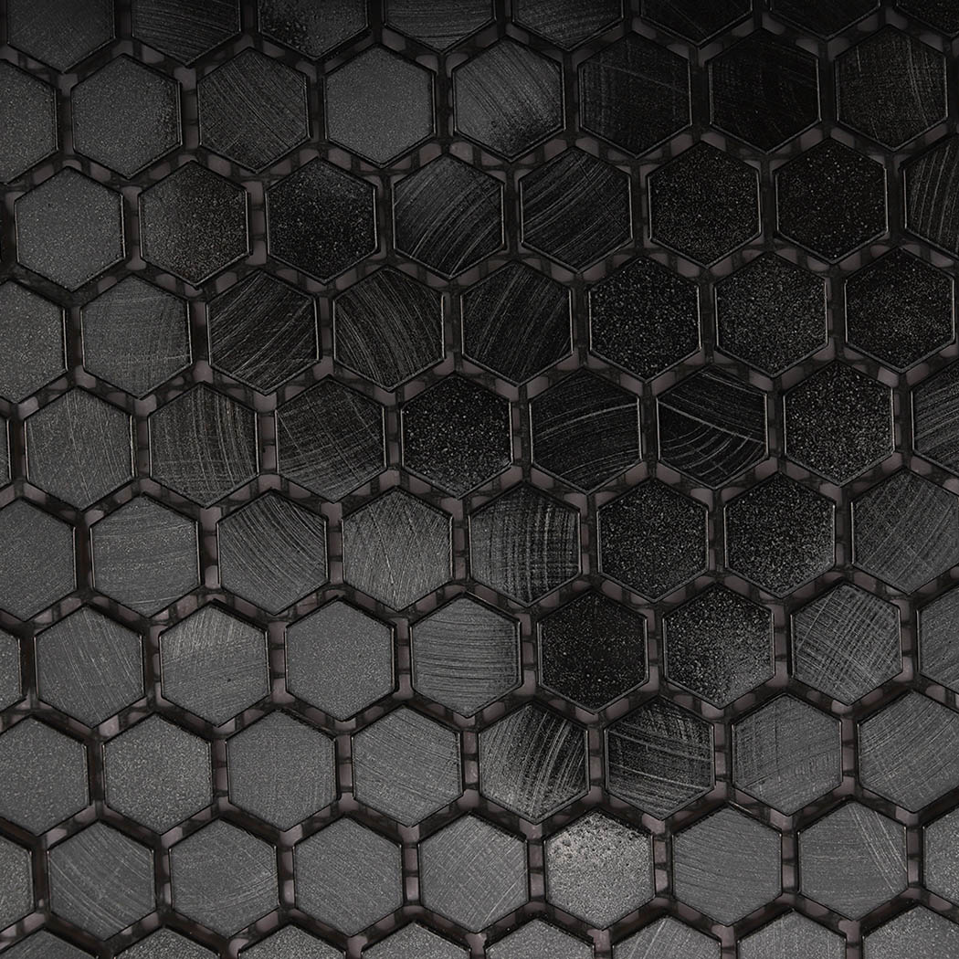 Surface detail of brushed matte black hexagon mosaic tile