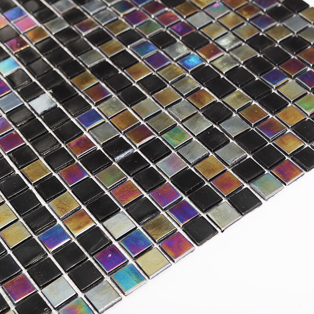 Angled surface view showing depth and shine of black iridescent glass mosaic tile