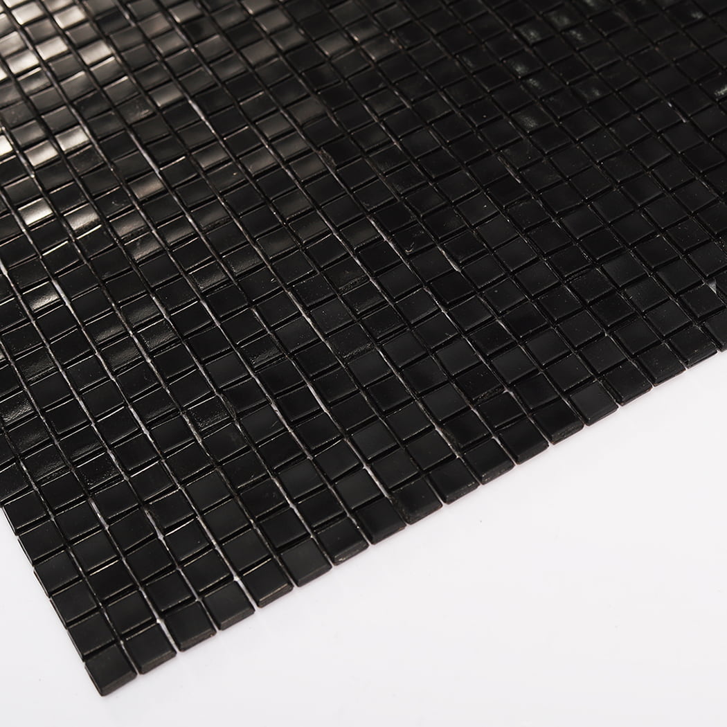 Low angle view showing edges and thickness of black mini glass mosaic tile