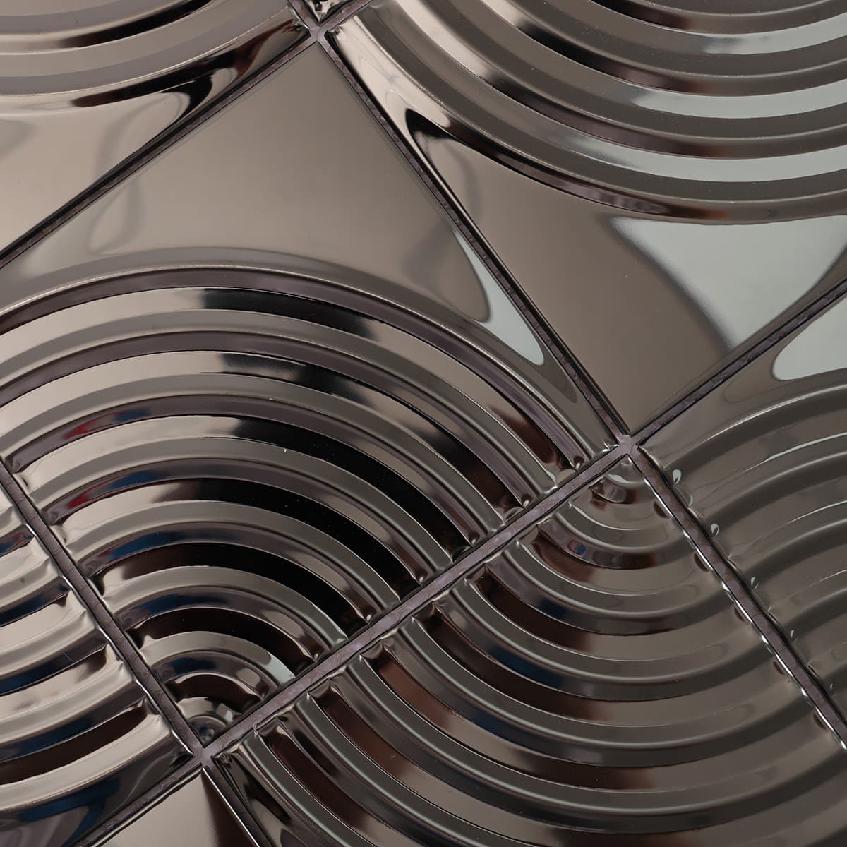 Surface detail of black mirror arc metal mosaic tile