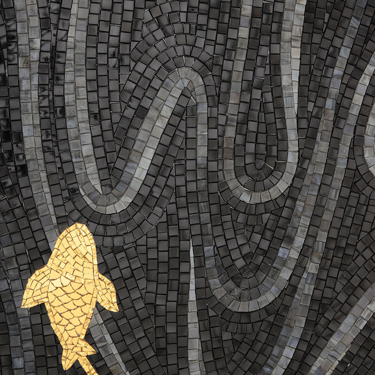 Black mosaic wave pattern with a gold koi fish accent