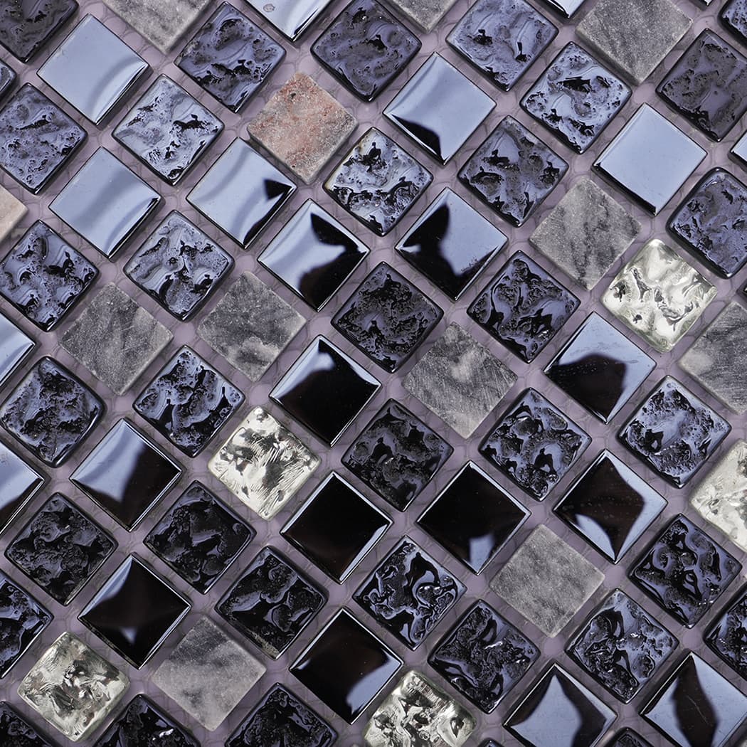 Close-up of black silver glass and stone mosaic tile pattern