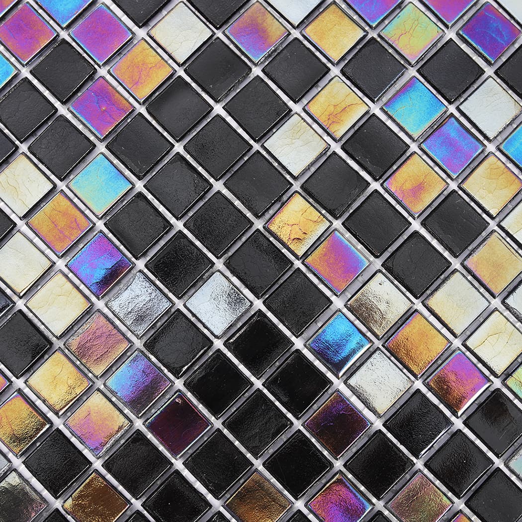 Diagonal texture view of black square glass mosaic with shimmering iridescent tiles