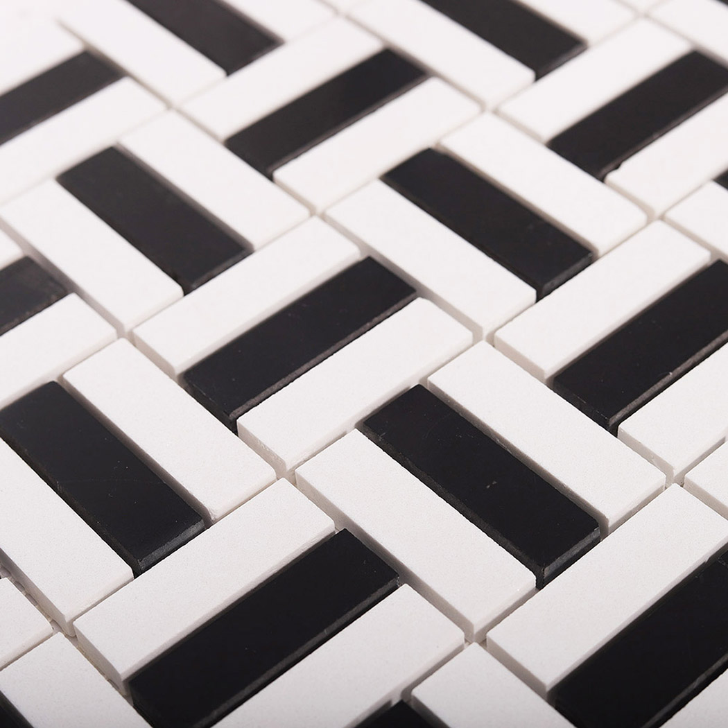 Detailed view of black and white rectangular mosaic tile pattern