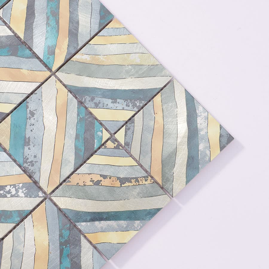 Close-up of blue aluminum patterned mosaic tile corner details