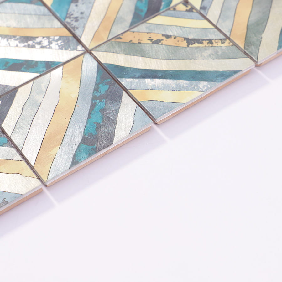 Close-up of blue aluminum patterned mosaic tile edge details