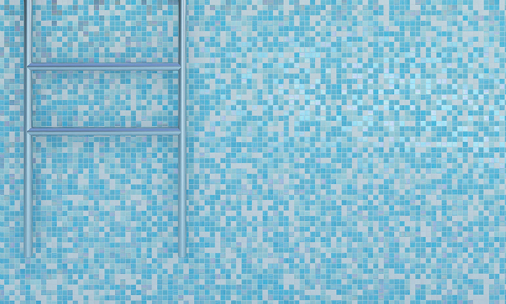 Blue and white mosaic tile wall pattern with pool ladder