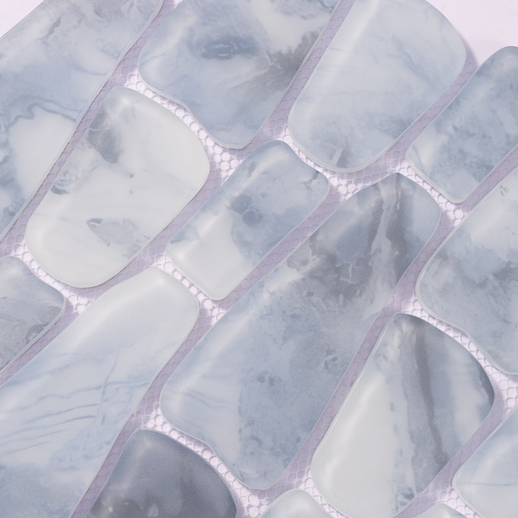Blue gray irregular pebble glass mosaic tile surface with softly rounded pieces