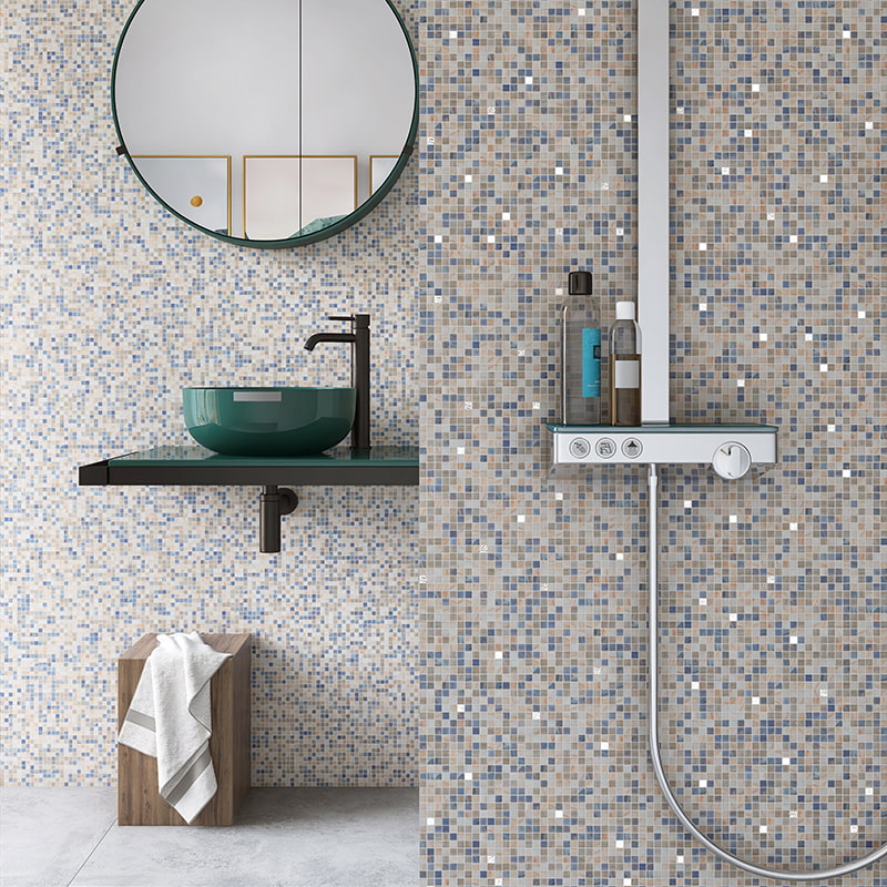 Glass mosaic wall in blue and gray mix used in shower and vanity