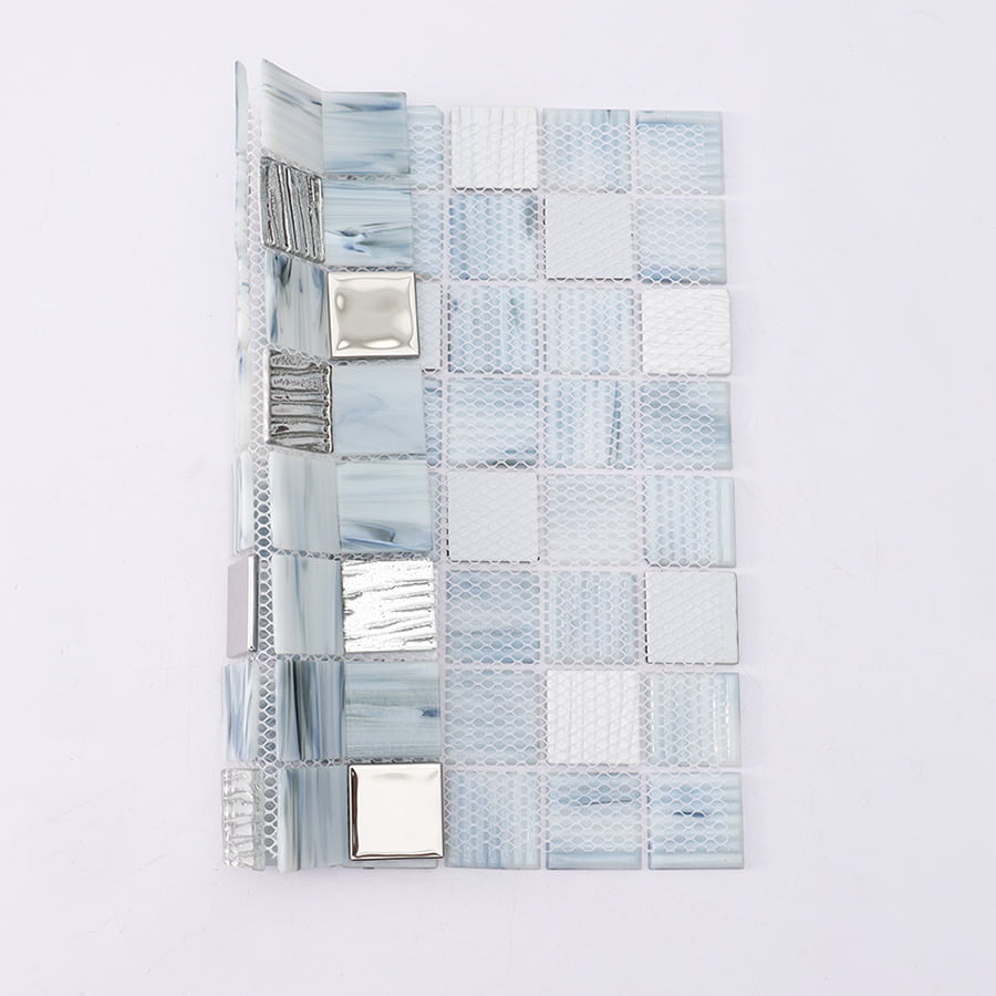 Back side view of blue gray mosaic tile sheet showing mesh backing