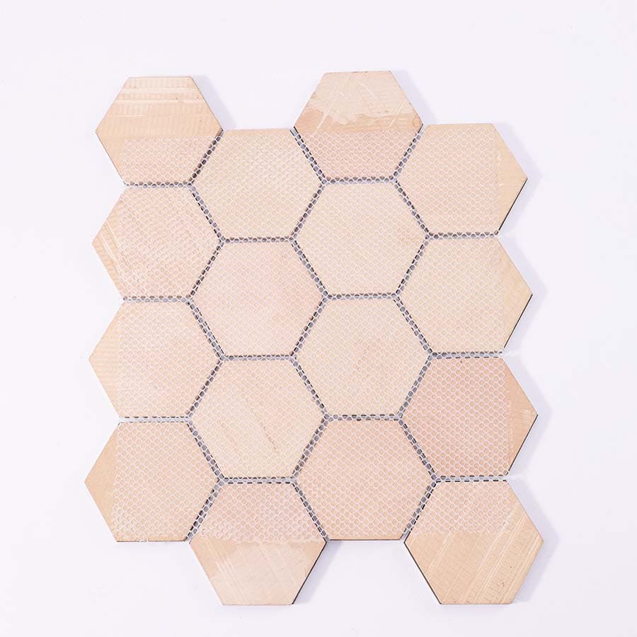 Back view showing mesh backing of blue and grey hexagon aluminum tiles