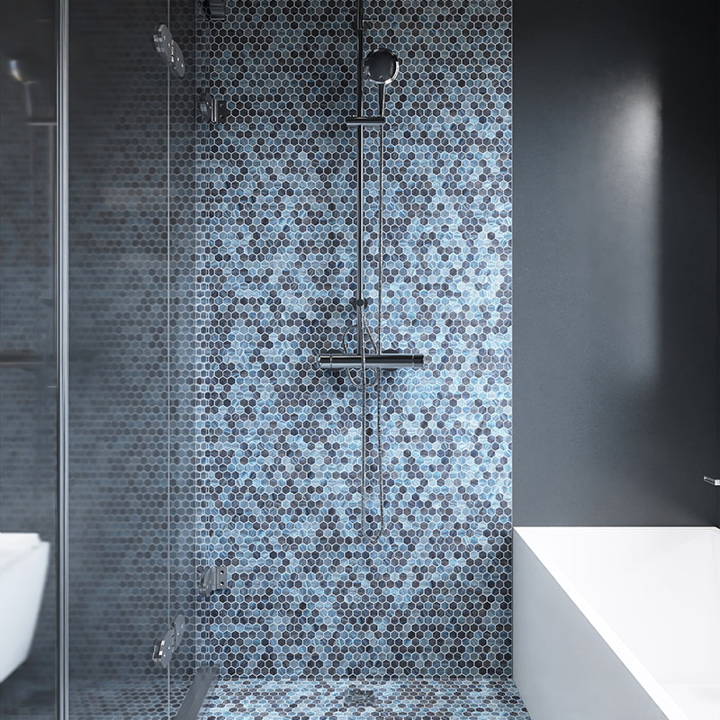 Blue hexagon glass mosaic tiles in modern shower wall and floor design