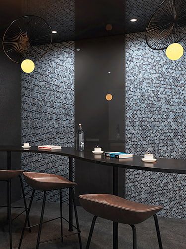 Blue glass hexagon mosaic wall tile with dynamic flowing pigment textures