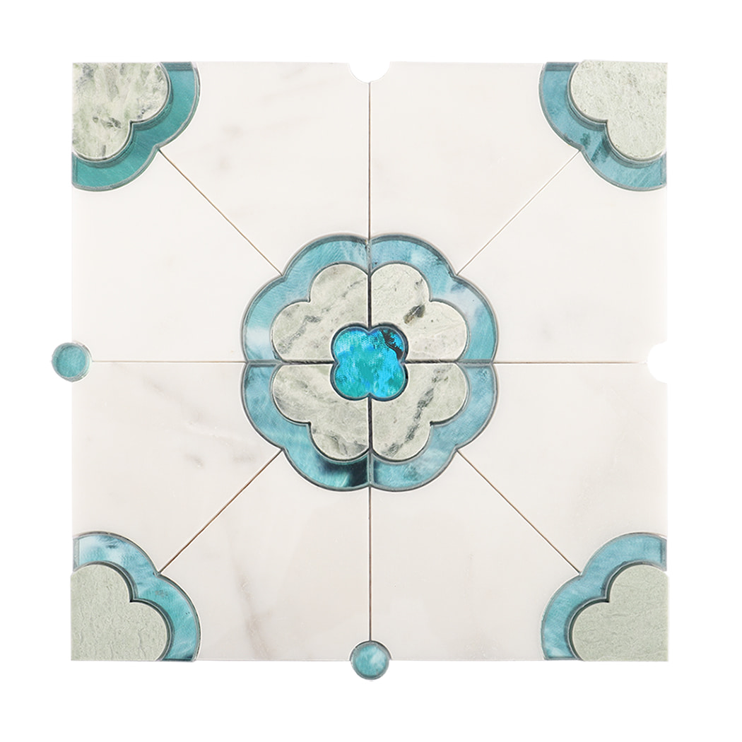 Top view of square mosaic tile with blue floral center on white stone