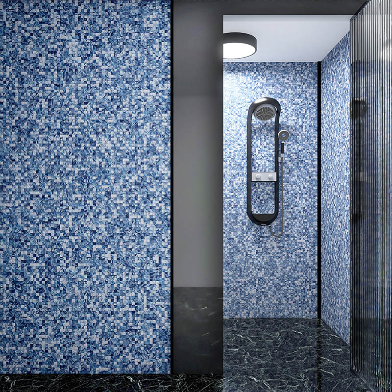 Blue shell mosaic tiles covering shower walls in a luxury bathroom