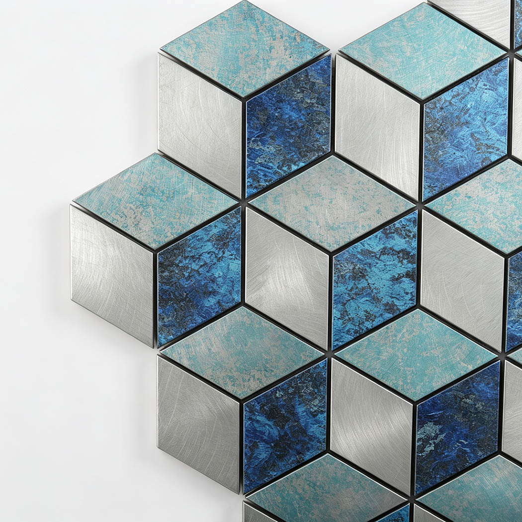 Close-up of brushed silver, blue, and turquoise hexagon aluminum mosaic pieces