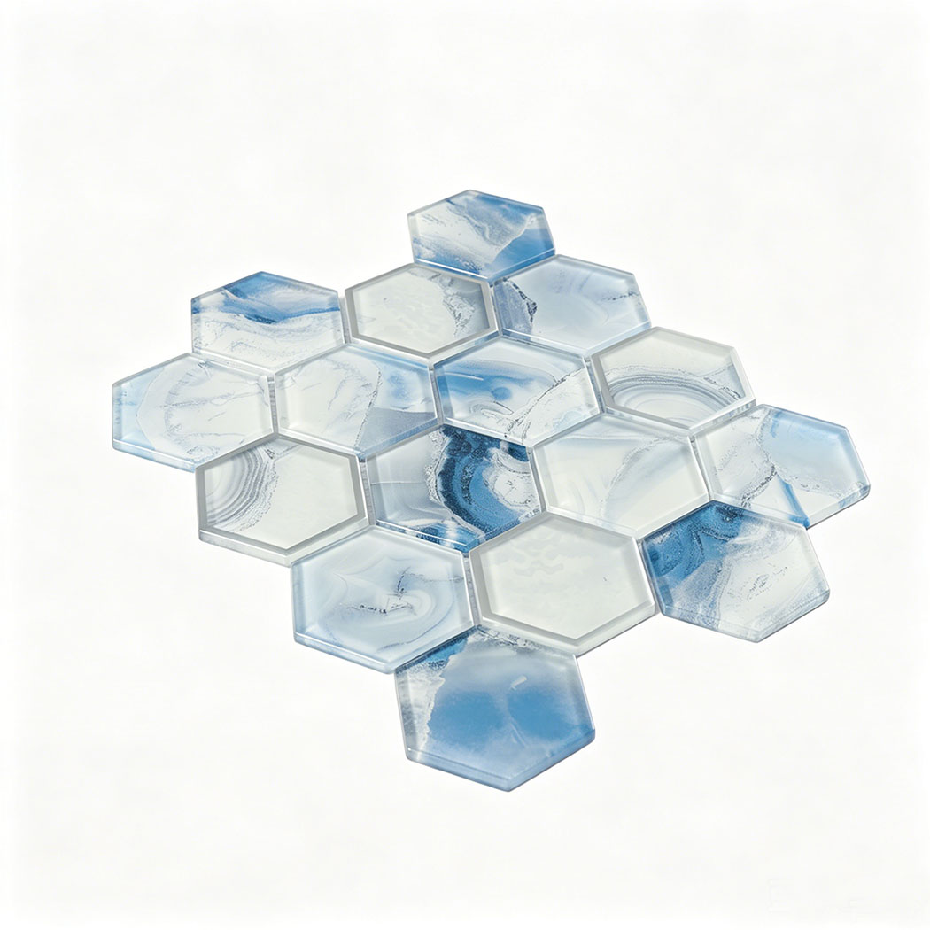 Angled display of blue white hexagon glass mosaic with mixed ocean style patterns
