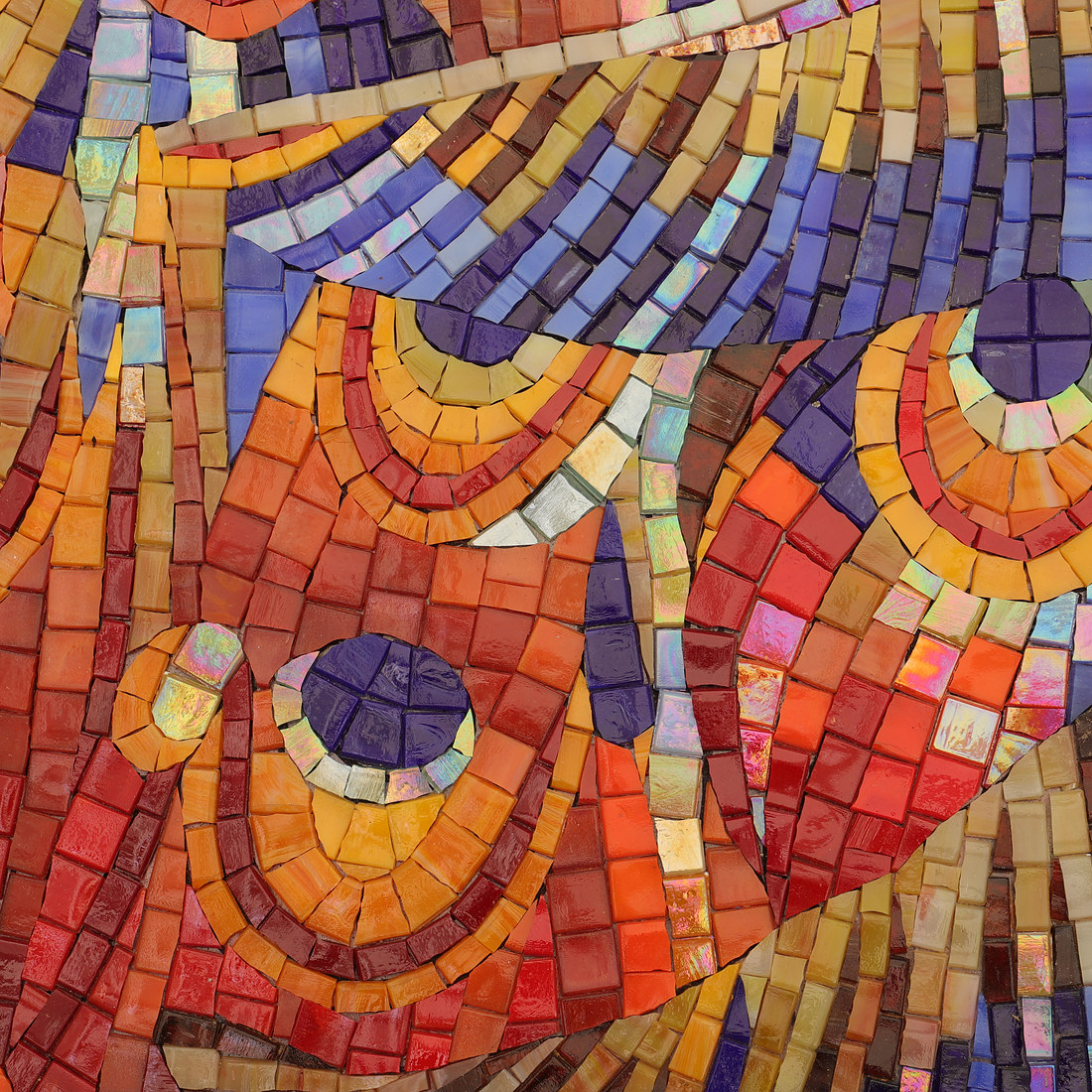 Bright peacock feather mosaic pattern with red blue and gold tiles