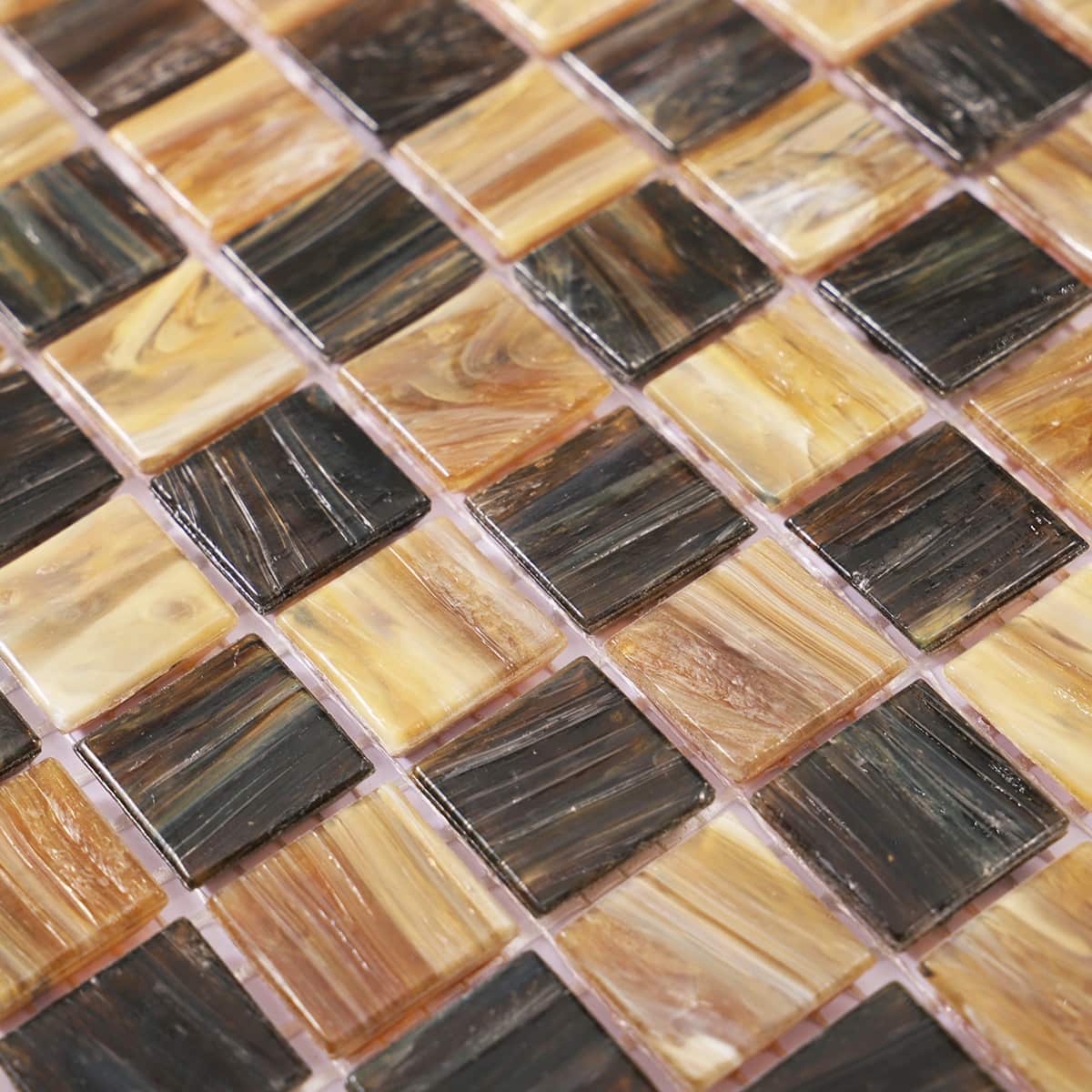 Angled view showing the surface of brown checkered glass mosaic