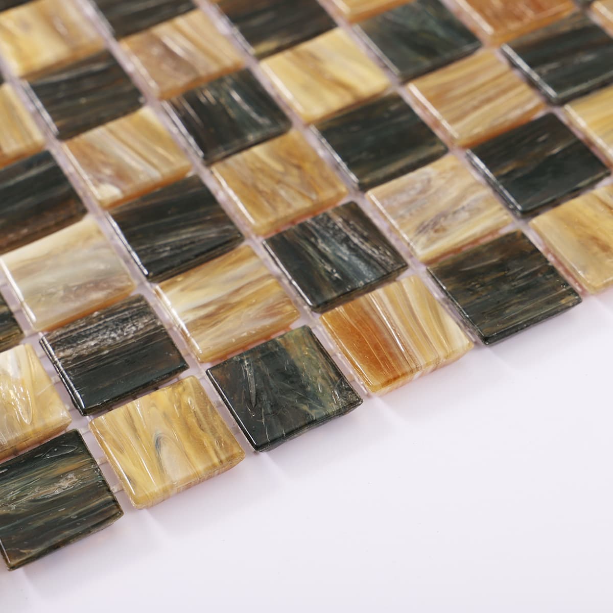Texture detail of brown checkered glass mosaic tile