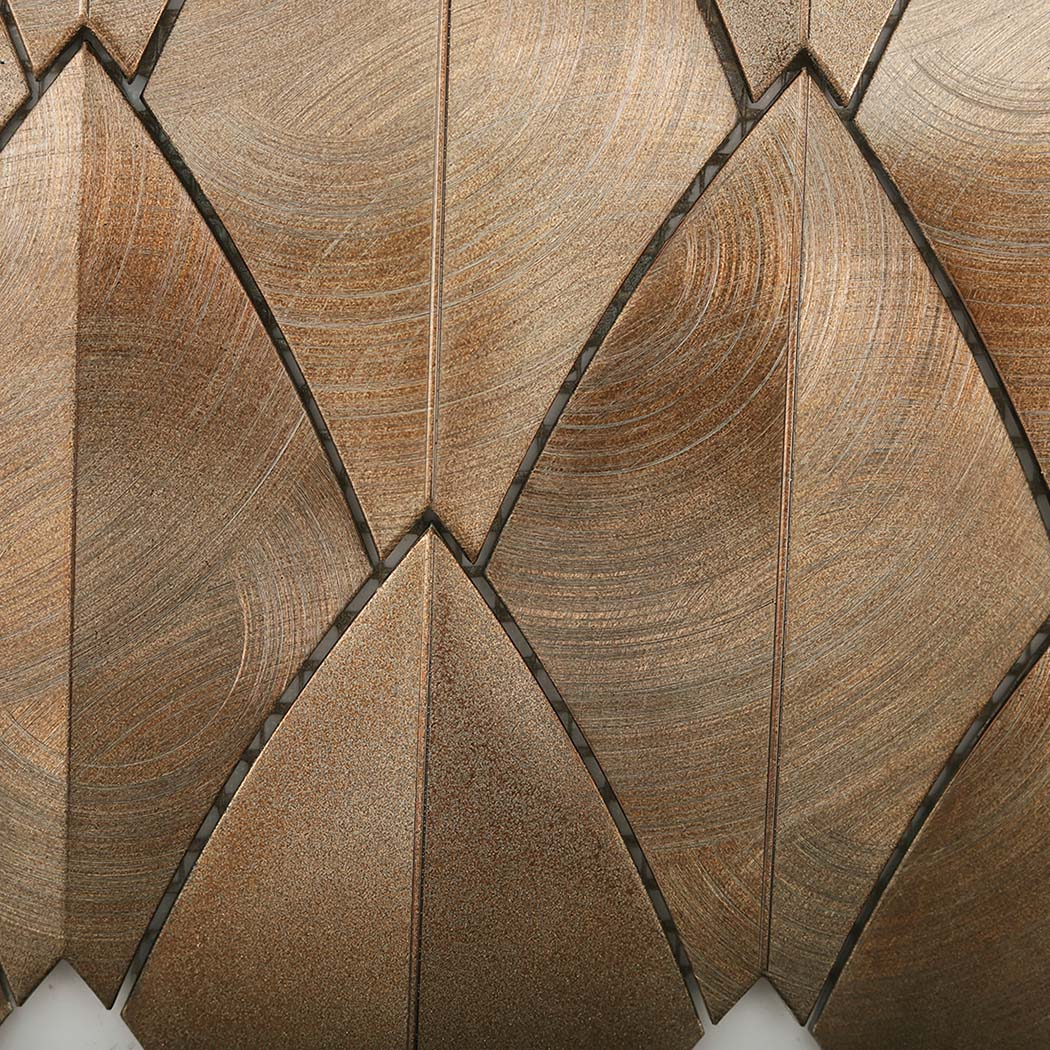 Close up of brushed texture on antique copper leaf aluminum tile chips