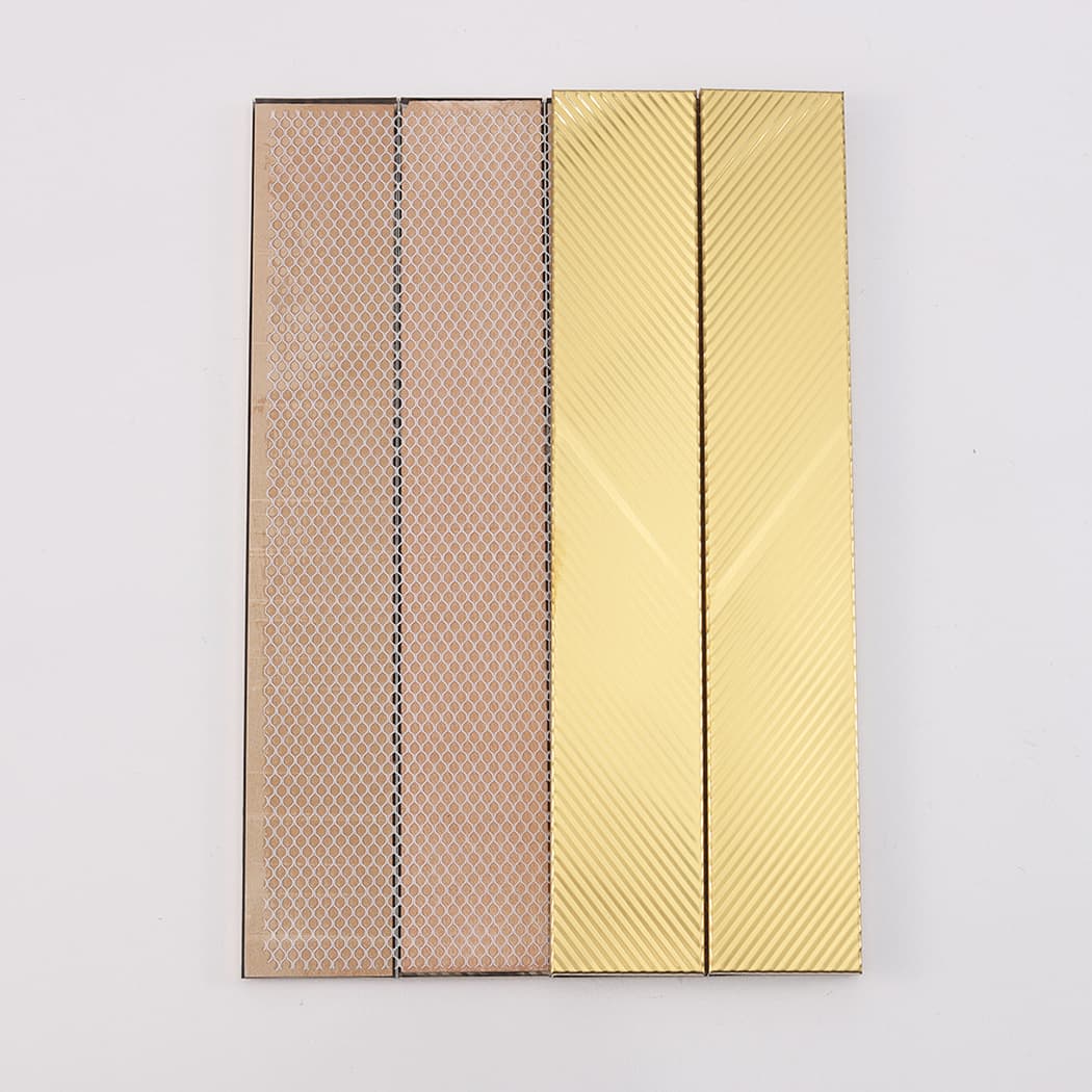 Back view of brushed gold stainless steel vertical tile sample with mesh backing