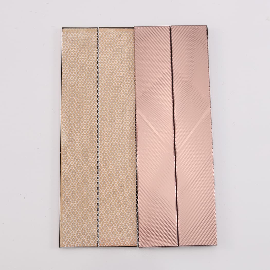 Back view of brushed rose gold stainless steel vertical tile sample with mesh backing