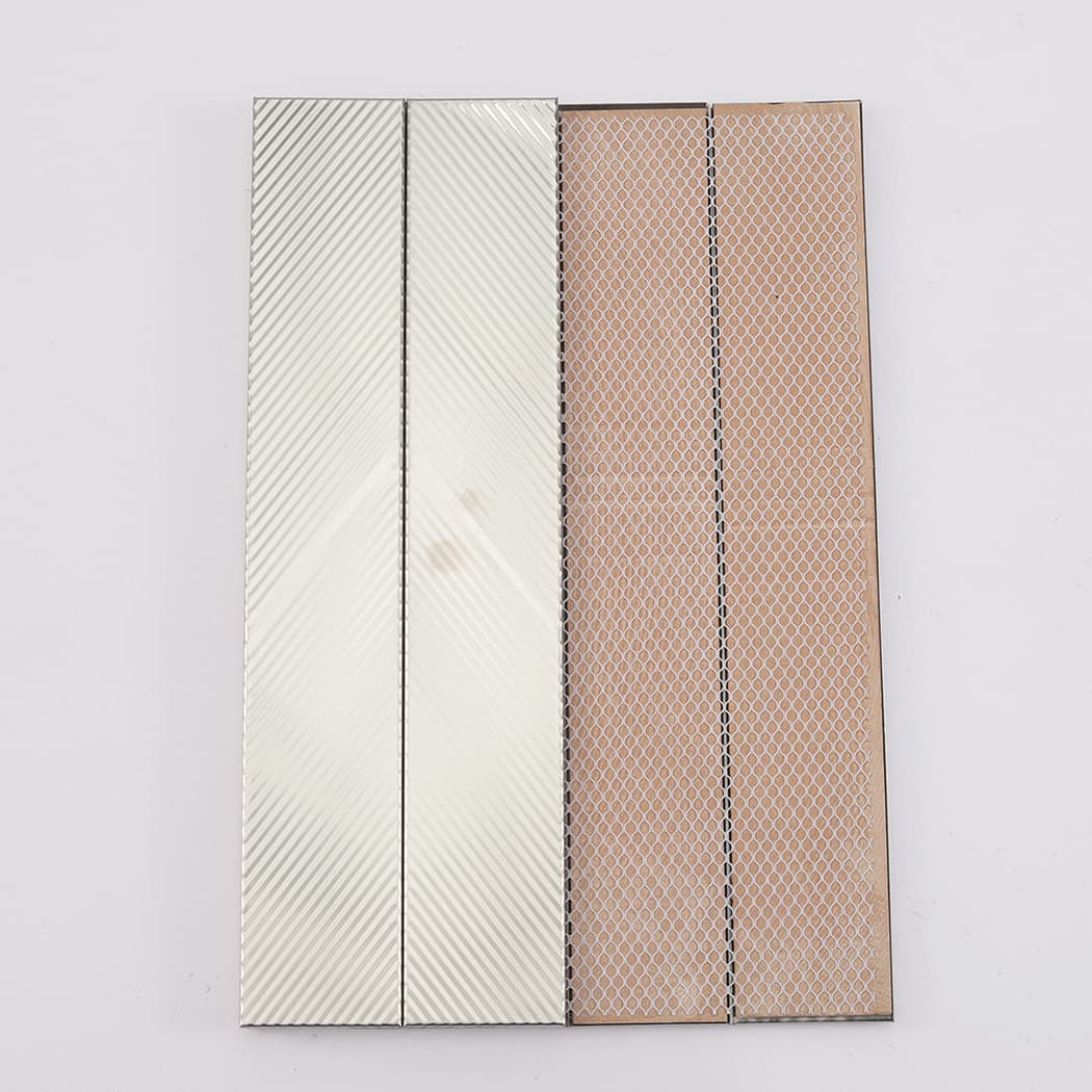 Back view of brushed silver stainless steel vertical tile sample with mesh backing
