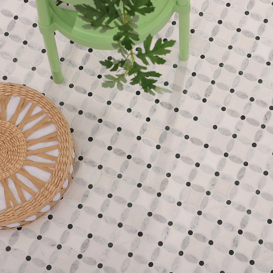 Carrara white and green flower marble mosaic tile flooring with chair and decor